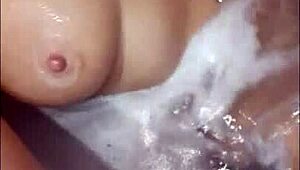 pretty woman teases in jacuzzi, masturbating to loud cumshot