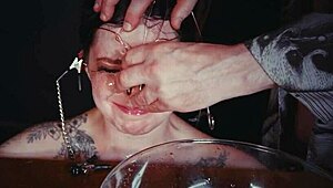 Emo bondage whore, your face is tied for piss punishment now