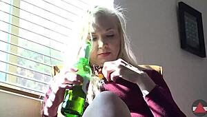 Giantess blonde model towers over toys and balloons, dominating with heels in wild play. Her tall frame rules!