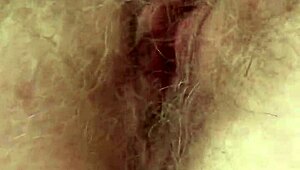 Wow, watch me stroke my hairy pussy till I explode!