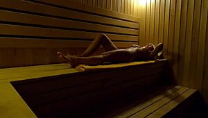 Oh my! Hidden camera catches girl fingering in sauna at night