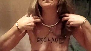 slave girl self-binds with belt