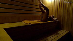 Oh my! Hidden camera catches girl fingering in sauna at night