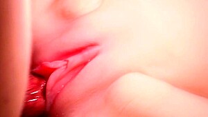 Pink color smooth vagina close-up