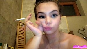 Smoking in bathtub, my big tits slave teen 18+ craves close-up attention. I feel so exposed!