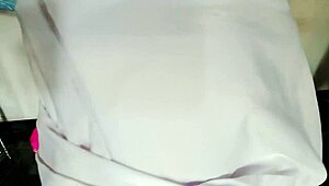 Sexy nurse asks, 'Want to see me squirt?' with pink vibrator