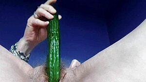 curious german granny plays with her hairy slit using a fresh cucumber