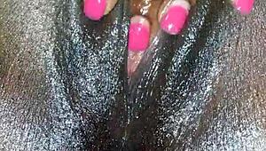 Black Ebony Woman Masturbates in Close-Up