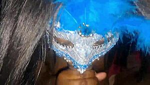 masked ebony receives a facial treatment