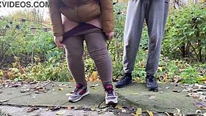 Depraved curvy milf squats in leggings to piss outdoors!