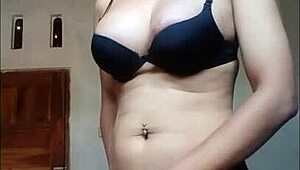 hey, see this shemale cum hard in black bra?