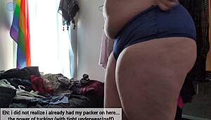 trying on clothes, teasing camera with and without packer