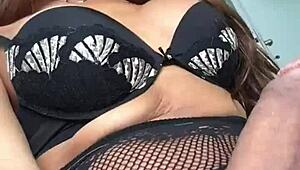 Izabela, the shemale goddess, shows off her big tits and monster cock in lingerie