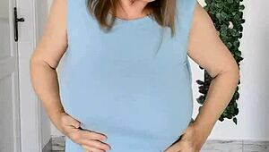 Busty gilf MariaOlds strips with sporty dance moves.