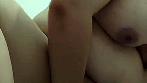 Vietnamese Babe Stuffs Bottle in Shaved Pussy for Wild Play