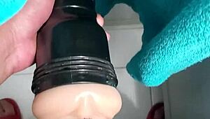 After a cold shower, black cock pounds a fleshlight with intense moans