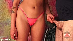 She begs for a panty fuck with close-up on her legs and pussy.