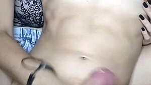 Debora prado masturbates big cock with lubricant and black nails.