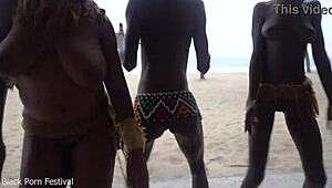 three african tribe witches perform a dancing ritual to make rain