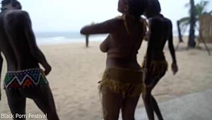 three african tribe witches perform a dancing ritual to make rain