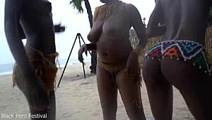 three african tribe witches perform a dancing ritual to make rain