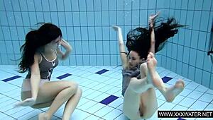 shaved brunette with big tits bathes in pool and shower underwater