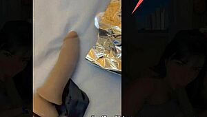 Trying on sexy outfits in a public store fitting room with a hot latina