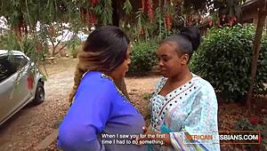 African MILF lesbians make out in public at house party