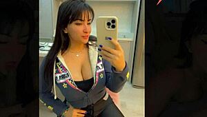 Trying on sexy outfits in a public store fitting room with a hot latina