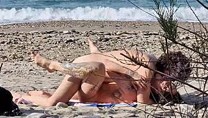 beach sex between two passionate lovers female squirting orgasms at 7 40 and 13 25 - - video shot with my new telephoto lens