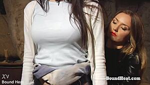 busty lesbian slave receives big black strapon for pussy pleasure 😘