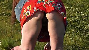 Beautiful brunette teen exposes hairy pussy outdoors in short skirt for doggystyle