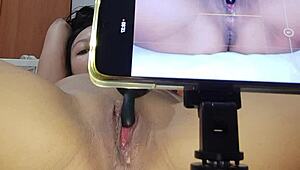 Amateur girl masturbates to orgasm and squirts cum