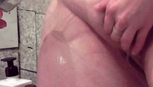 Sexy Milf Frina Shaves Her Grown Hairy Pussy and Pubis in Bathroom for Smooth Shaved Look