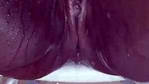 Black milf shaves her wet pussy for orgasm. She uses toys in homemade close-up.