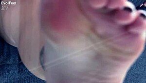 Miss Bimby the brunette teases viewers with her stilettos and barefoot poses in shoes