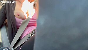 Artemisia Love flashes her big boobs during a horny car ride.