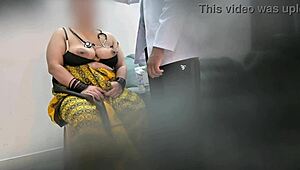 In the hospital clinic, the Indian doctor is using the Asian patient intimately