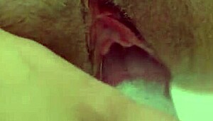 Natural busty redhead masturbates closeup with clear dildo!