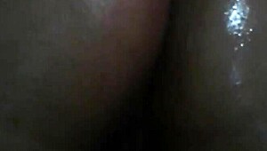 an argentinian woman received an oiled massage, focusing on her back and legs in a relaxing session.