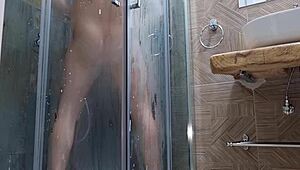 Horny and sexy guy jerks in shower with moans.