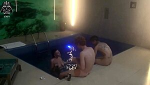 hey, check out this uncensored threesome with my wife and friends in the motel pool, flashing nipples and big cocks