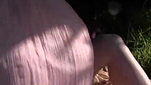 bella rossi and missy minks kiss and lick each other's pussies with a toy outdoors.