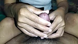 My friend's wife expertly strokes and cums on his cock in homemade group fun