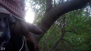 outdoor masturbation session ends with a cum shot in the trees