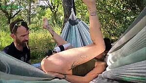 happy teen girl masturbates outdoors in a hammock in spain