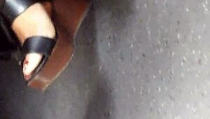 Mature feet candidly shown in wedges and sandals