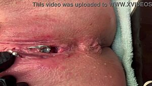 Woman Rubs Pierced Area With Gloves And Experiences Strong Urination