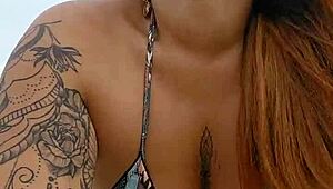 Young african woman flashes panties on beach to seduce married men