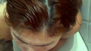 The huge husband commands his wife to kneel and suck his massive cock while admiring her big ass.